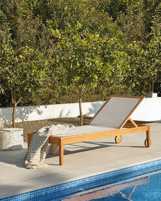 Caterin solid eucalyptus wood outdoor sun lounger in beige, FSC 100%