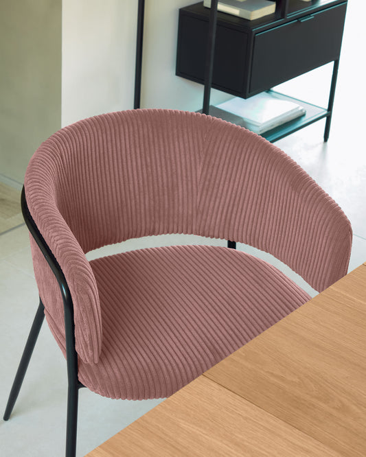 Runnie chair made from pink wide seam corduroy with steel legs in black finish