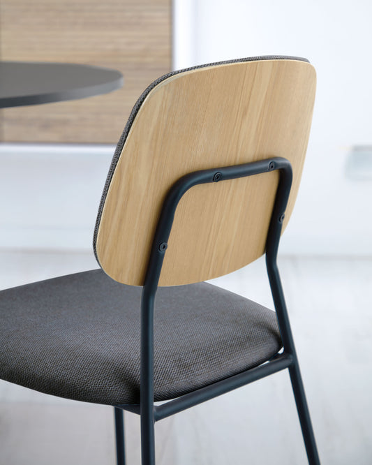 Benilda dark grey stackable chair with oak veneer and steel in black FSC Mix Credit