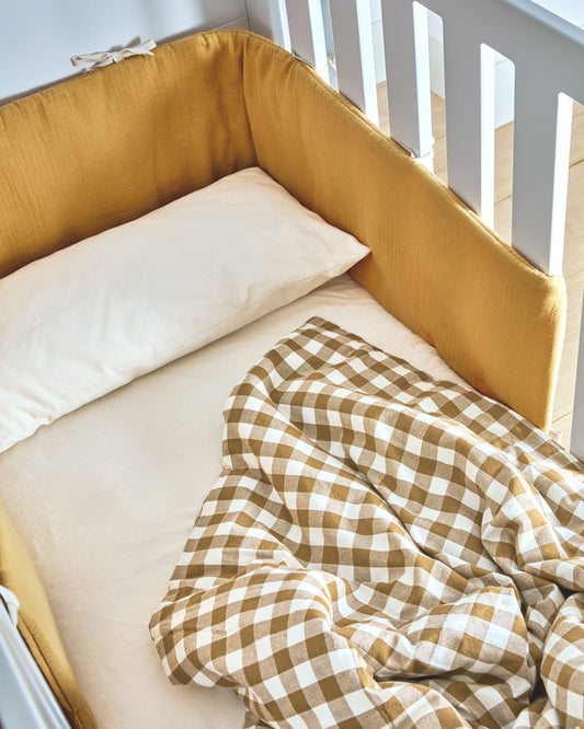 Yamile crib protector 100% organic cotton (GOTS) in mustard 180 x 30 cm