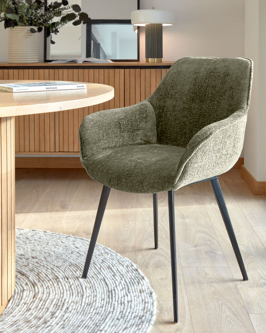 Amira chair in dark green chenille with steel legs with black finish