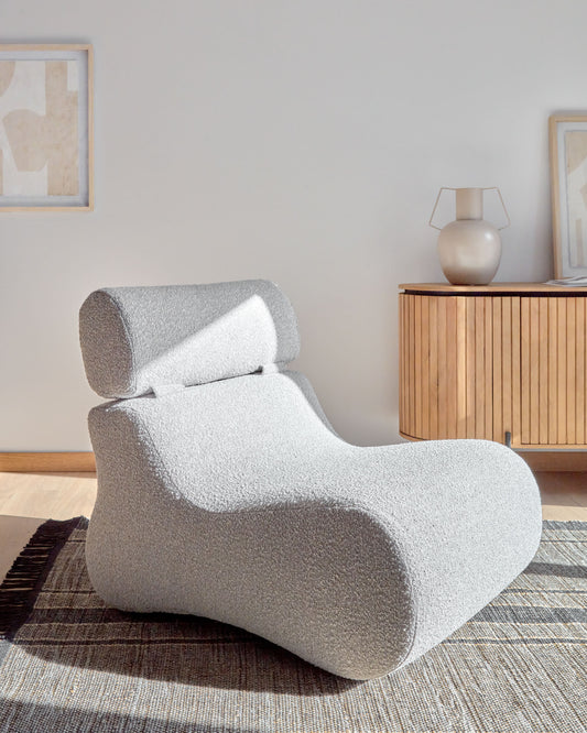 Club armchair in light grey bouclé