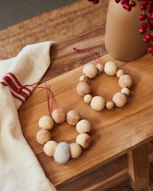 Suze set of 2 hanging ornaments made from felt and wood.