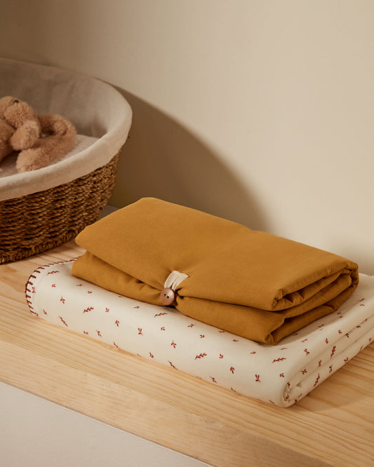 Deya travel baby changing mat in mustard cotton