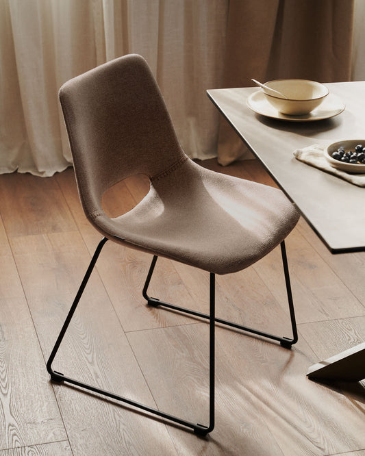 Zahara chair in brown with steel legs in a black finish