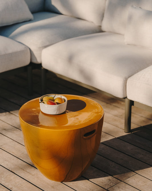 Mesquida outdoor side table made of ceramic with glazed mustard finish Ø 45 cm