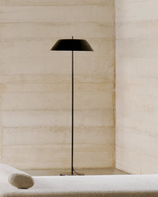 Sayra floor lamp made of black marble and metal in a black painted finish