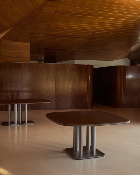 Melvar table made from walnut veneer and legs with brushed stainless steel base 121 x 121cm