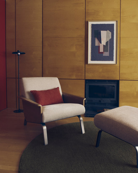 Amsen beige armchair in oak plywood with legs in brushed stainless steel