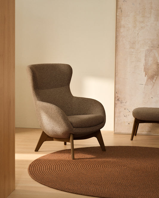 Adiran armchair in light brown thick chenille with solid oak wood legs with a walnut finish