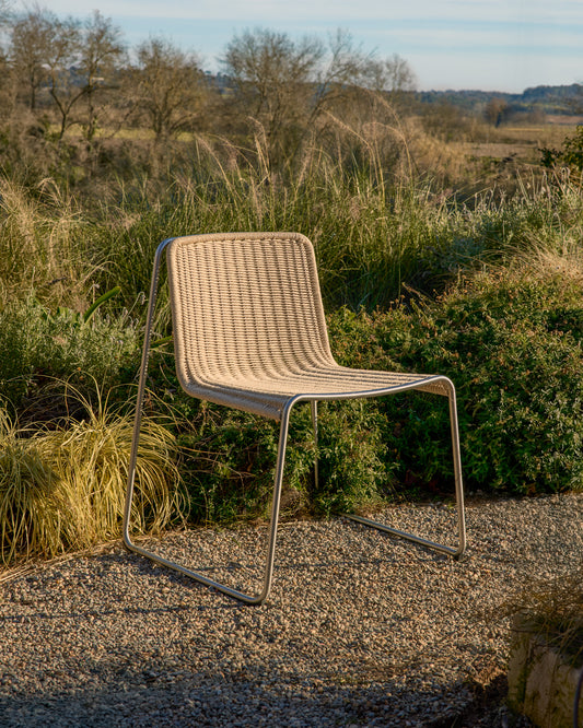 Tavari stackable chair in beige synthetic rope cord and AISI 304 stainless steel with brushed finish