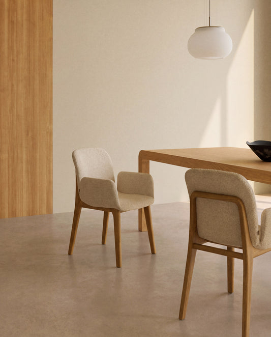 Elnor chair with armrests in beige chenille with solid oak wood legs in a natural finish
