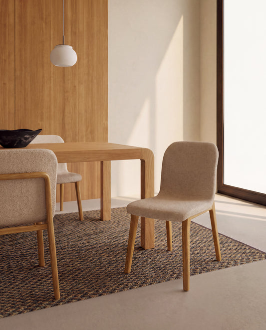 Elnor chair in beige chenille with solid oak wood legs in a natural finish