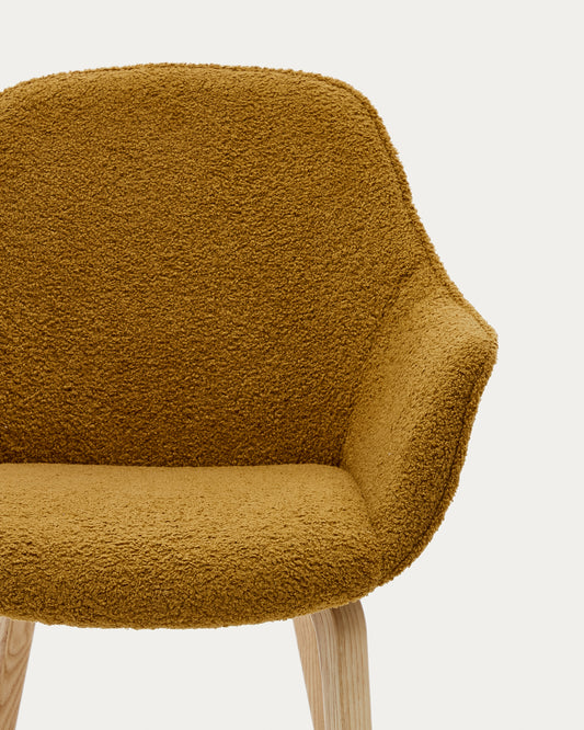 Aleli chair in mustard bouclé with solid ash wood legs and natural finish