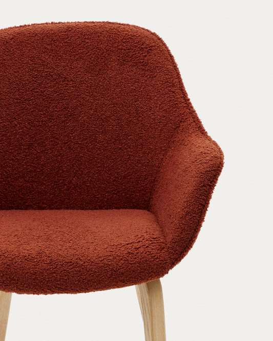 Aleli chair in terracota bouclé with solid ash wood legs and natural finish