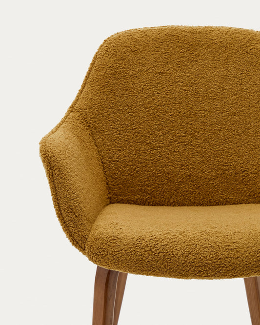 Aleli chair in mustard bouclé with solid ash wood legs and walnut finish