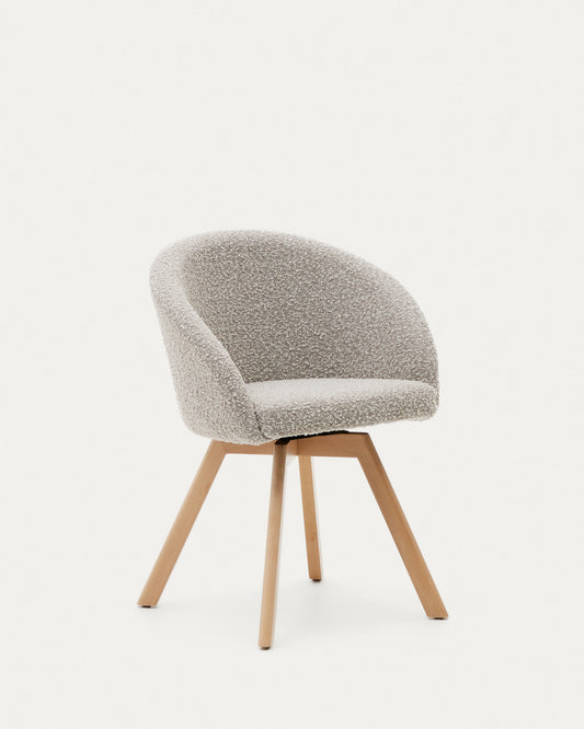 Marvin swivel chair with grey bouclé and beech wood legs in a natural finish FSC 100%