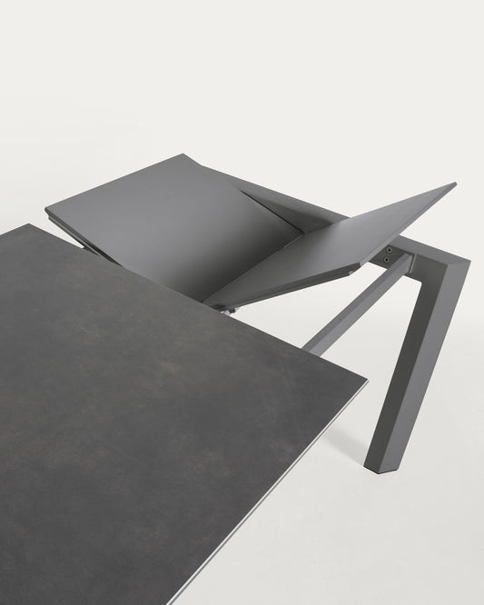 Axis extendable porcelain table with Volcano Rock finish and dark grey steel legs, 120 (180) cm