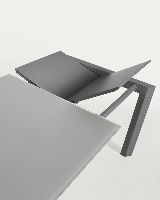 Axis extendable table in grey glass with steel legs in a dark grey finish, 160 (220) cm