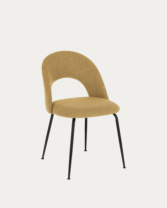 Mahalia dining chair in mustard with steel legs, with a black painted finish.