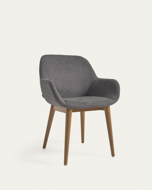 Konna chair in dark grey with solid ash wood legs in a dark finish