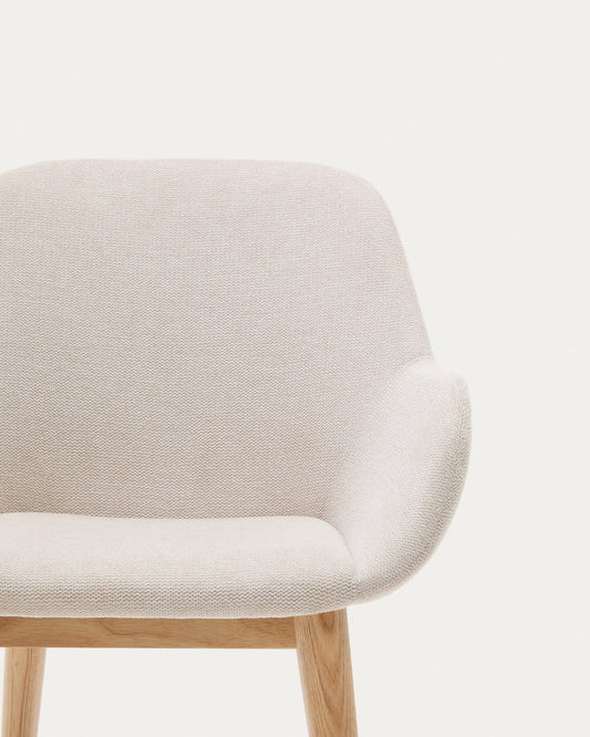 Konna chair in beige with solid ash wood legs in a natural finish