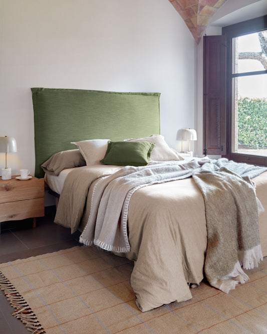Tanit headboard with removable green linen cover for a bed up to 160 cm