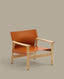 Jan armchair made of light brown recycled leather fibres and FSC 100% solid ash wood with natural tone finish
