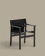 Jan chair made of black recycled leather fibres and FSC 100% solid ash wood with black finish