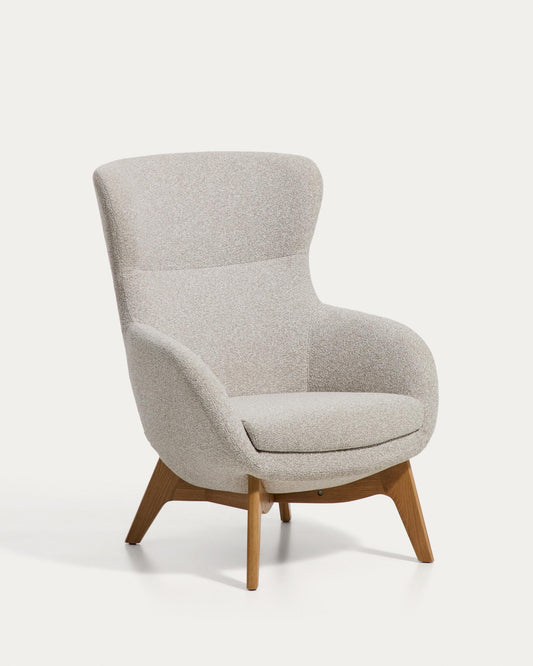 Adiran armchair in beige thick chenille with solid oak wood legs with a natural finish