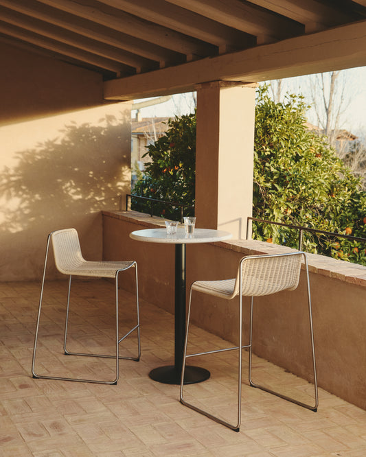 Saura round high bar table made of black metal with a white terrazzo top, 96 x Ø70 cm