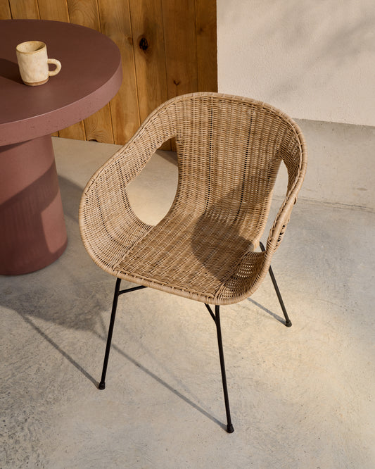 Eltiera stackable chair in synthetic rattan with black steel frame