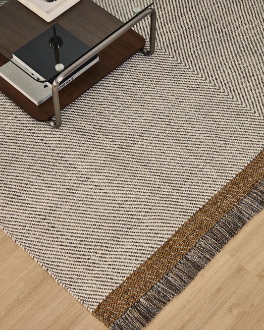 Brina beige herringbone jacquard wool rug 230 x 160cm
