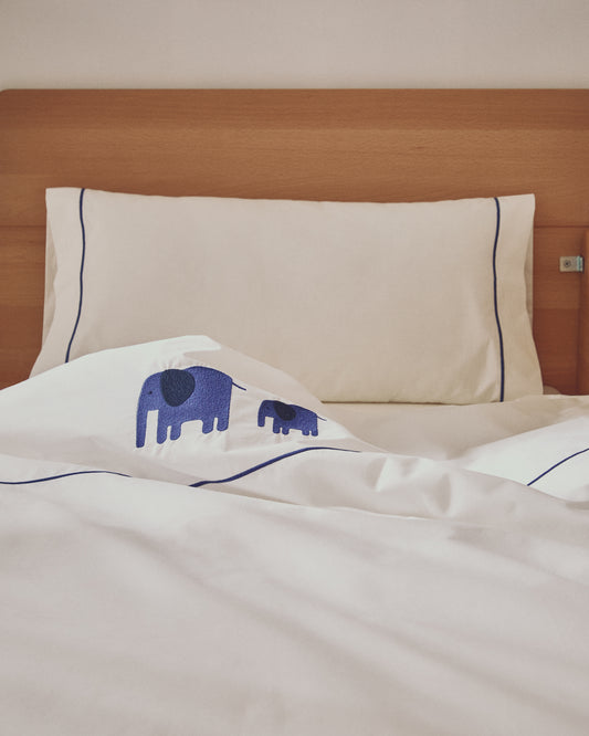 Tandari duvet cover and pillowcase set in beige cotton percale with embroidered elephant for convertible cot