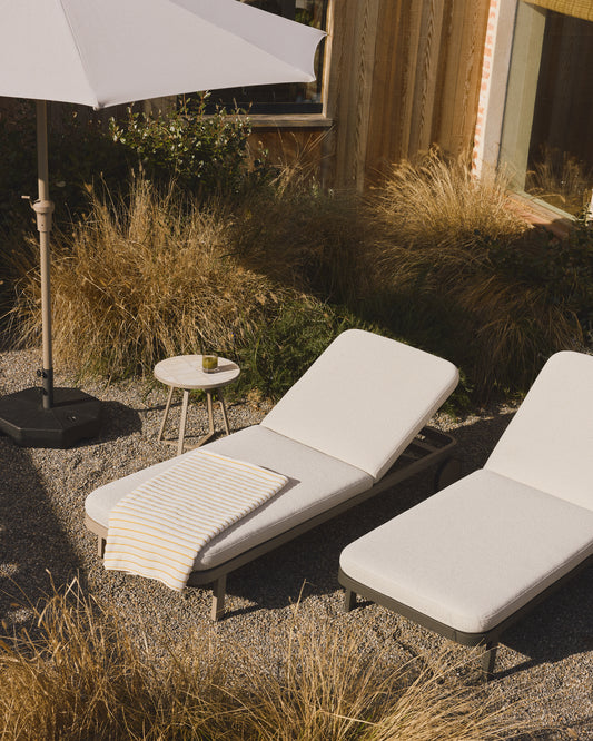 Kionia taupe aluminium sun lounger.