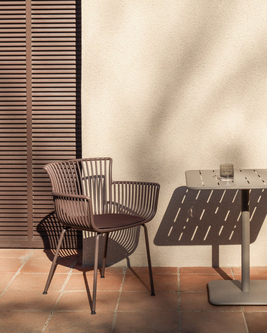 Surpika outdoor chair with brown steel legs
