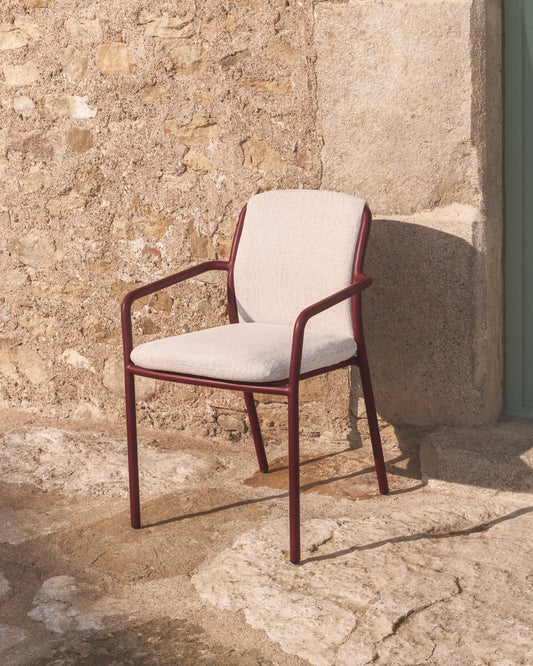 Linosa stackable outdoor chair in burgundy aluminium with beige cushion