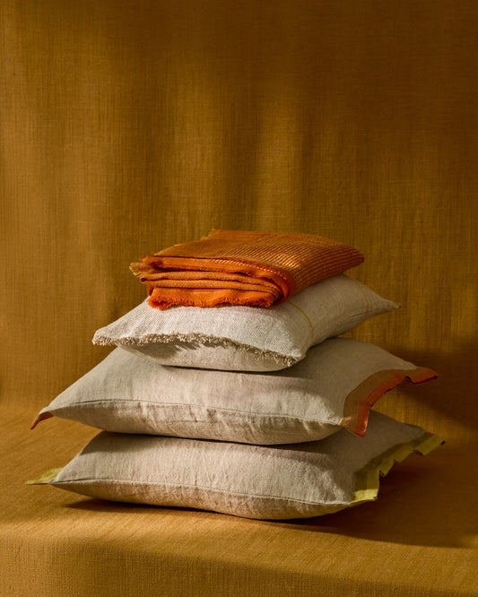 Disea cushion cover in beige linen with orange detail 45 x 45cm
