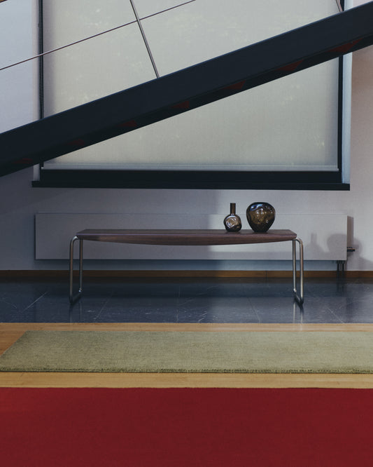 Tarsel bench in walnut veneer with brushed stainless steel structure 142cm