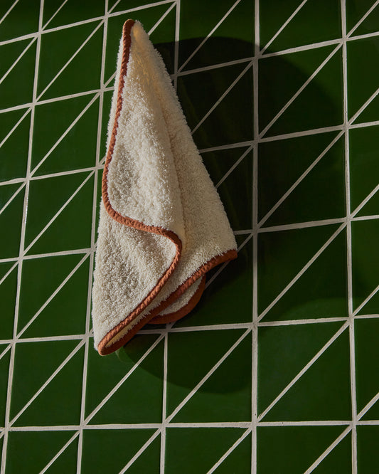 Sedora 100% cotton towel with orange contrast detail 30 x 50cm