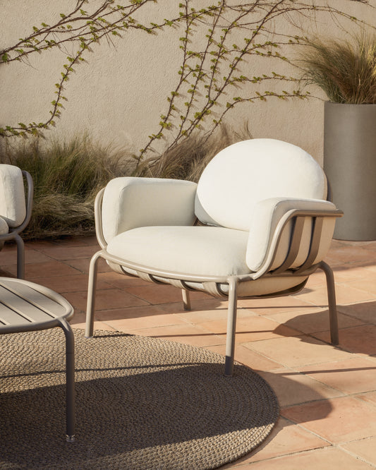Joncols outdoor armchair in aluminium with taupe painted finish and beige cushions