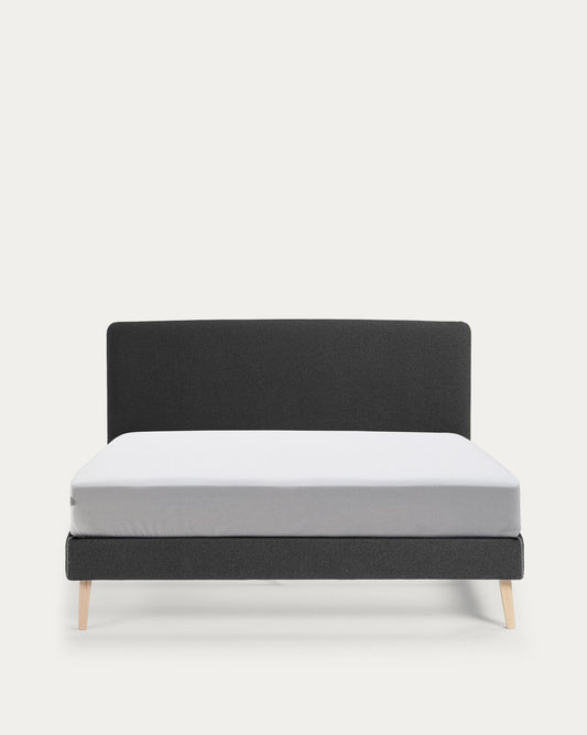 Dyla bed with removable cover in black, with solid beech wood legs for a 160 x 200 cm mattress