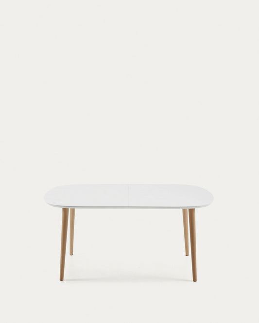 Oqui extendable oval table with an oak veneer and solid wood legs, Ø 160 (260) x 100 cm