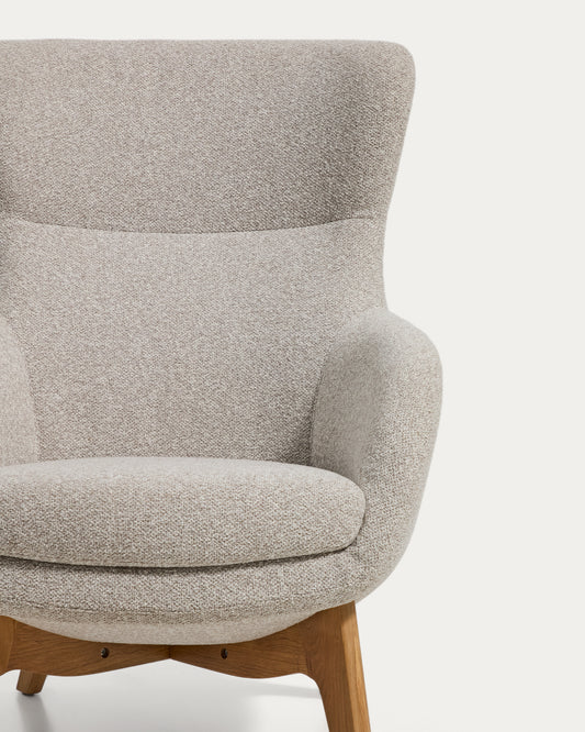 Adiran armchair in beige thick chenille with solid oak wood legs with a natural finish
