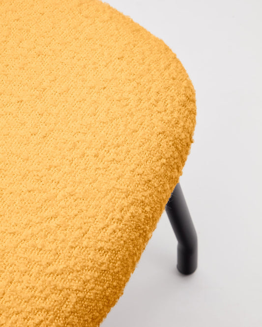 Belina footrest in mustard bouclé and steel with black finish FSC 100%