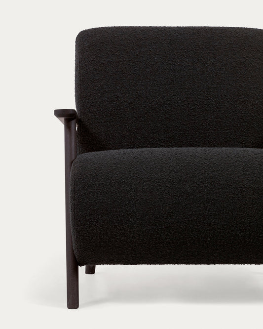 Meghan armchair in black bouclé with solid ash legs with wenge finish