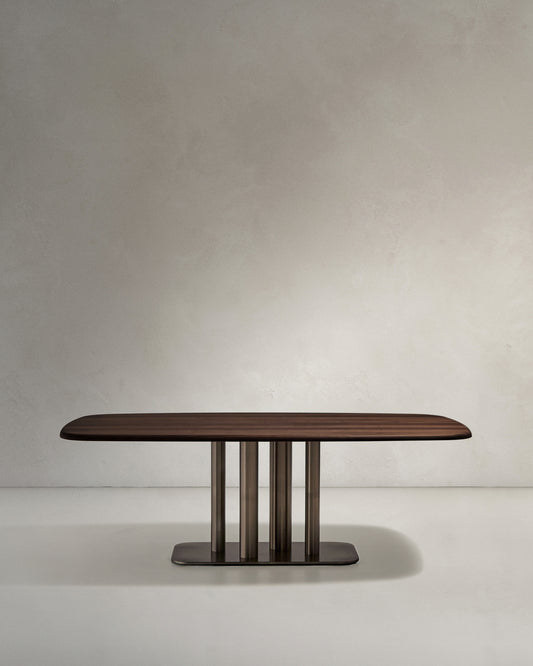 Melvar table made from walnut veneer and legs with brushed stainless steel base 180 x 100cm